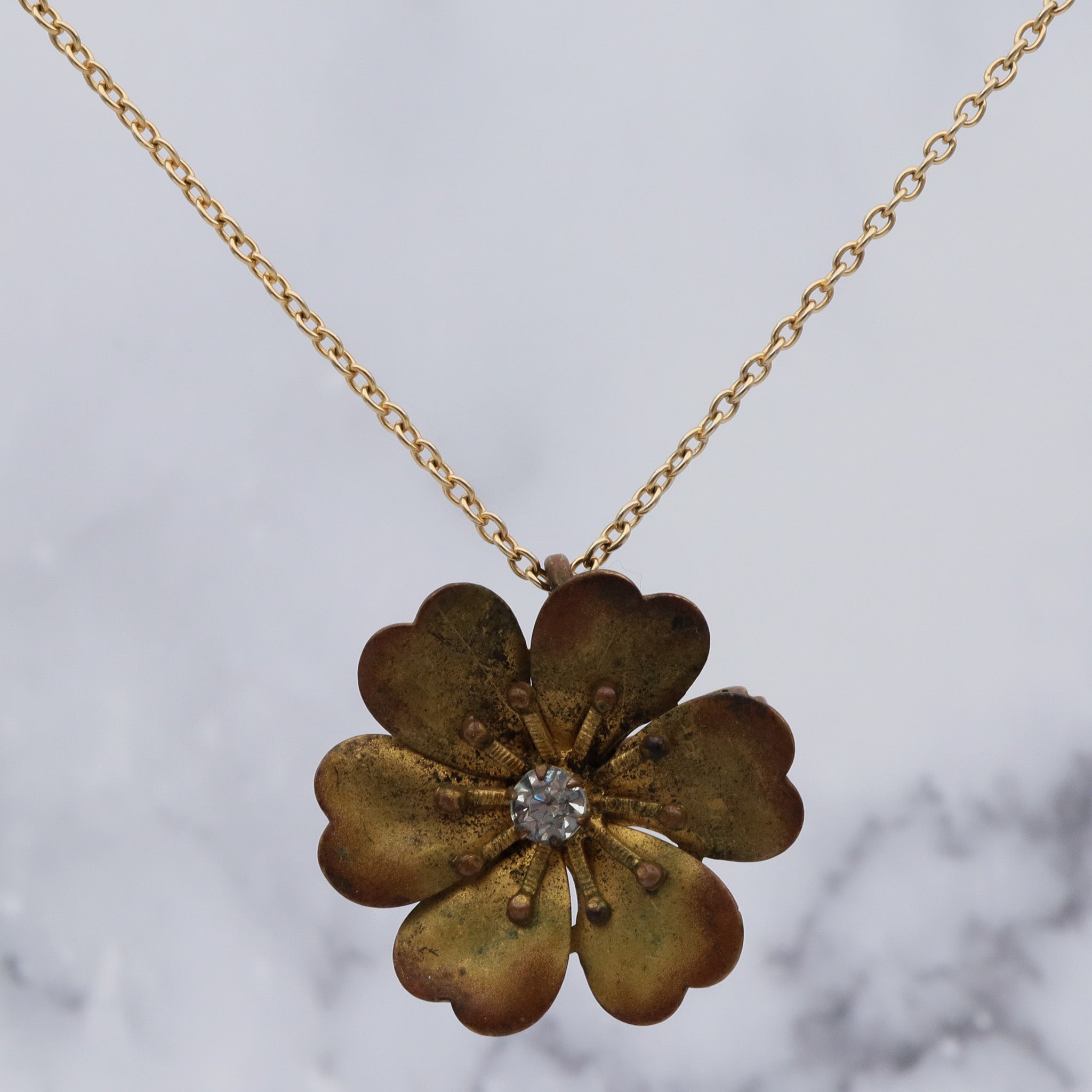 Antique Victorian painted brass & rhinestone flower brooch with pendant loop